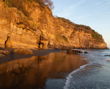 The Science of El Zonte’s Black Sand: Volcanoes, Magnetism, & Grounding